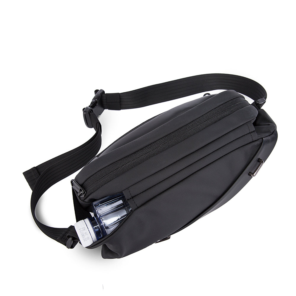Pechera The Sling Bag de Bange Perú para viajes, color negro y compartimento para tomatodo